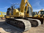 Used Excavator under blue sky